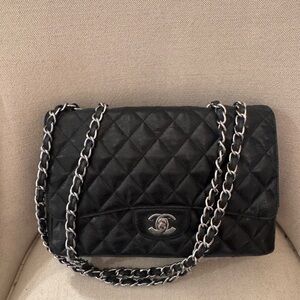 Chanel Black caviar quilted Jumbo single flap Shoulder Bag w Box & dust bag.